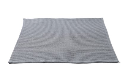 Photo of Clean grey waffle towel isolated on white