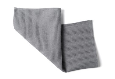 Photo of Clean grey waffle towel isolated on white, top view