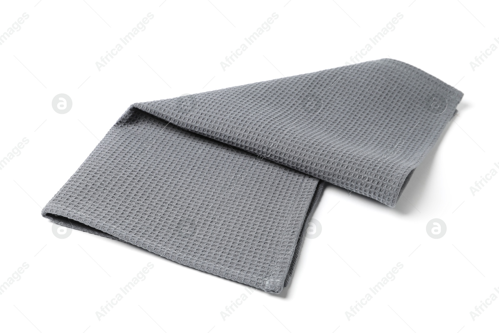 Clean grey waffle towel isolated on white Photo of Clean grey waffle towel isolated on white