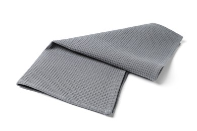 Photo of Clean grey waffle towel isolated on white
