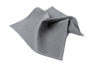 Photo of Clean grey waffle towel isolated on white