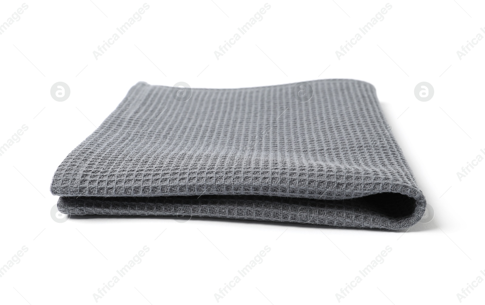 Clean grey waffle towel isolated on white Photo of Clean grey waffle towel isolated on white