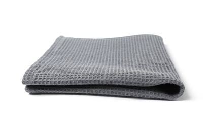 Photo of Clean grey waffle towel isolated on white