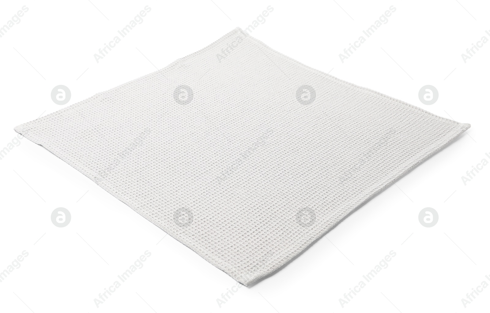 Clean light grey waffle towel isolated on white Photo of Clean light grey waffle towel isolated on white
