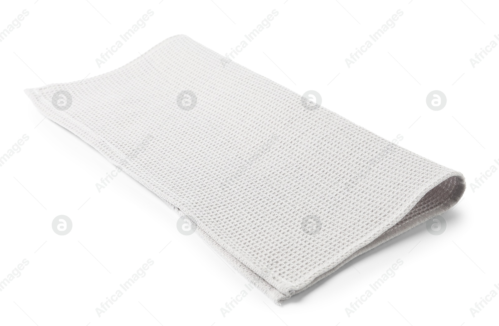 Clean light grey waffle towel isolated on white Photo of Clean light grey waffle towel isolated on white