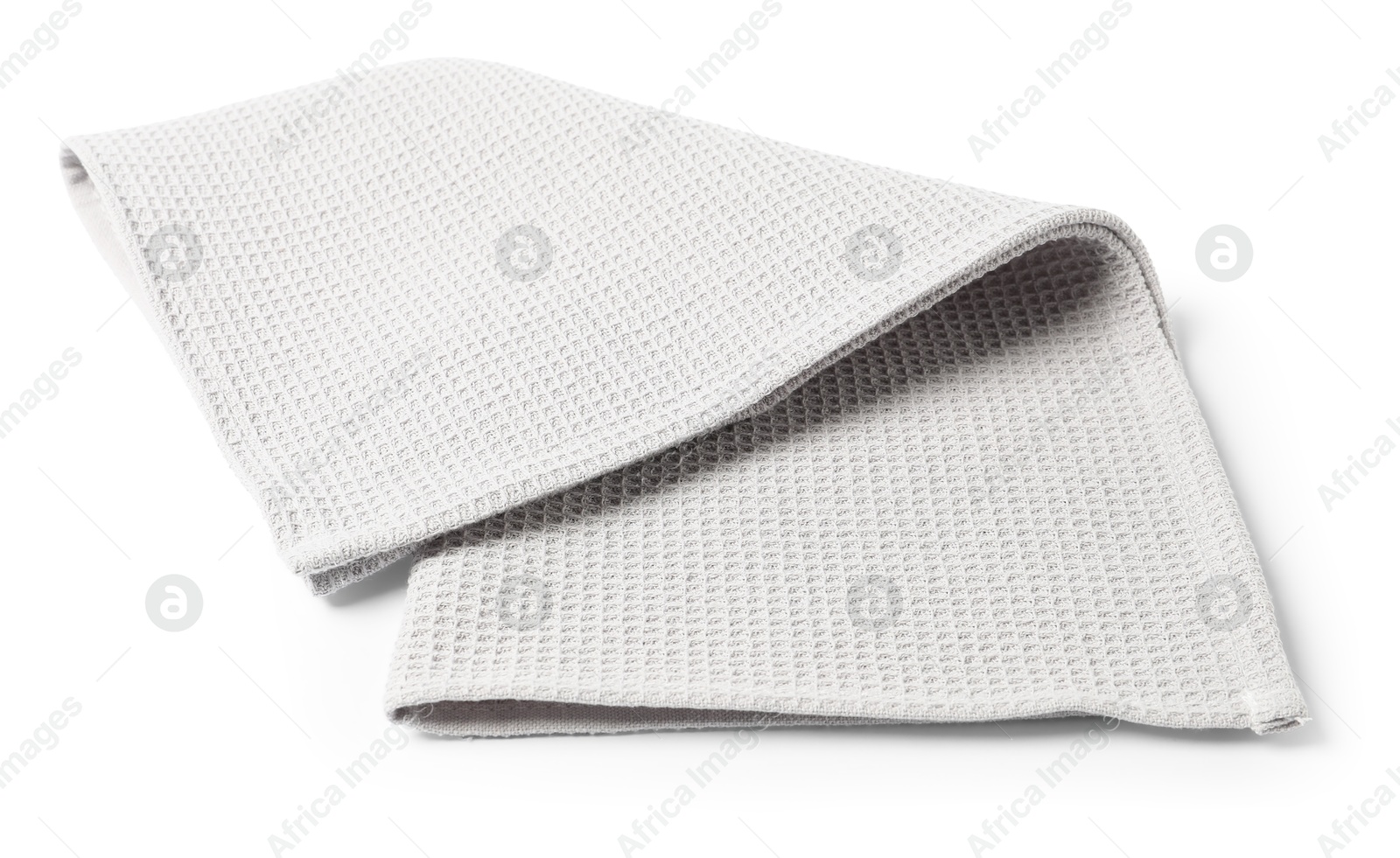 Clean light grey waffle towel isolated on white Photo of Clean light grey waffle towel isolated on white
