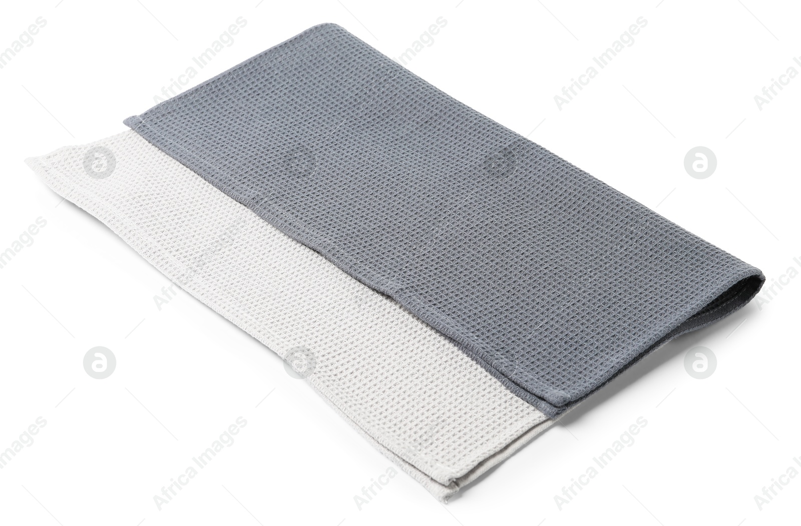 Two clean waffle towels isolated on white Photo of Two clean waffle towels isolated on white