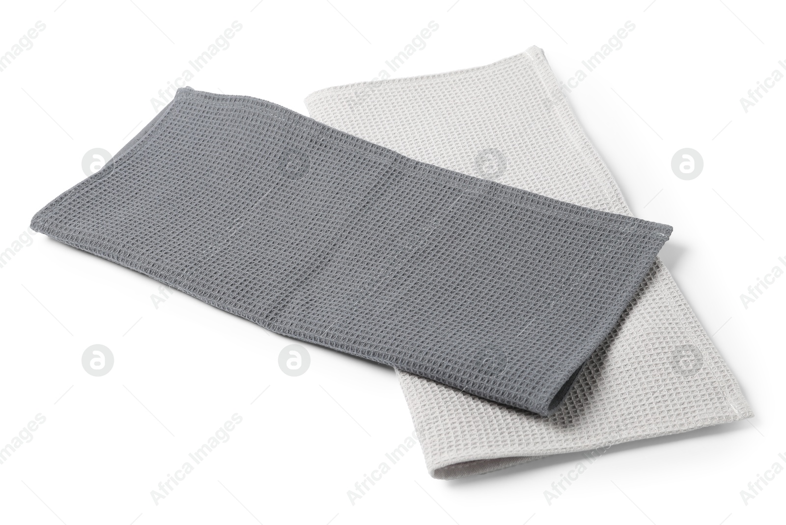 Two clean waffle towels isolated on white Photo of Two clean waffle towels isolated on white