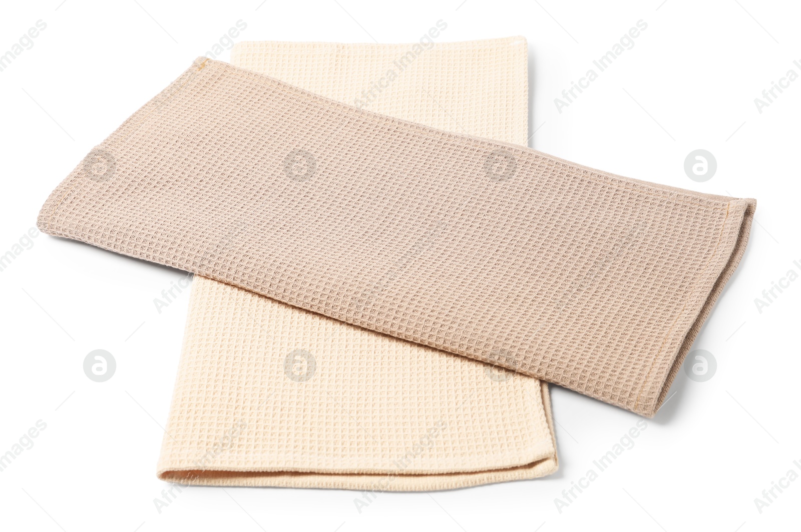 Two clean waffle towels isolated on white Photo of Two clean waffle towels isolated on white