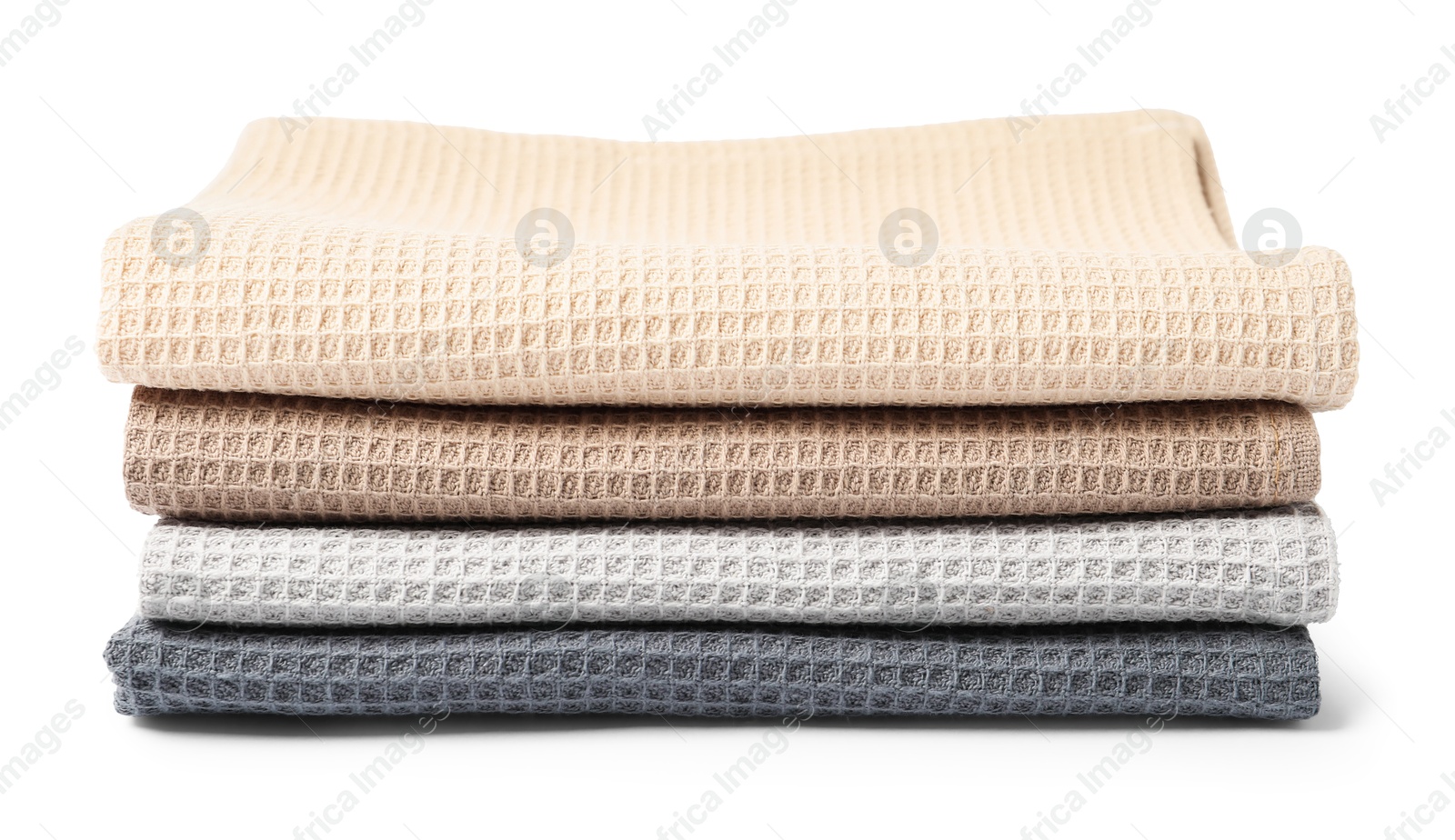 Many clean waffle towels isolated on white Photo of Many clean waffle towels isolated on white