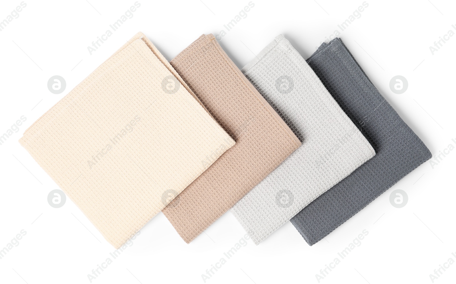 Many clean waffle towels isolated on white, top view Photo of Many clean waffle towels isolated on white, top view