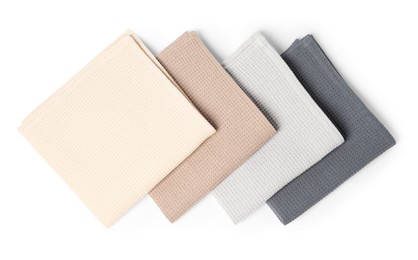 Photo of Many clean waffle towels isolated on white, top view