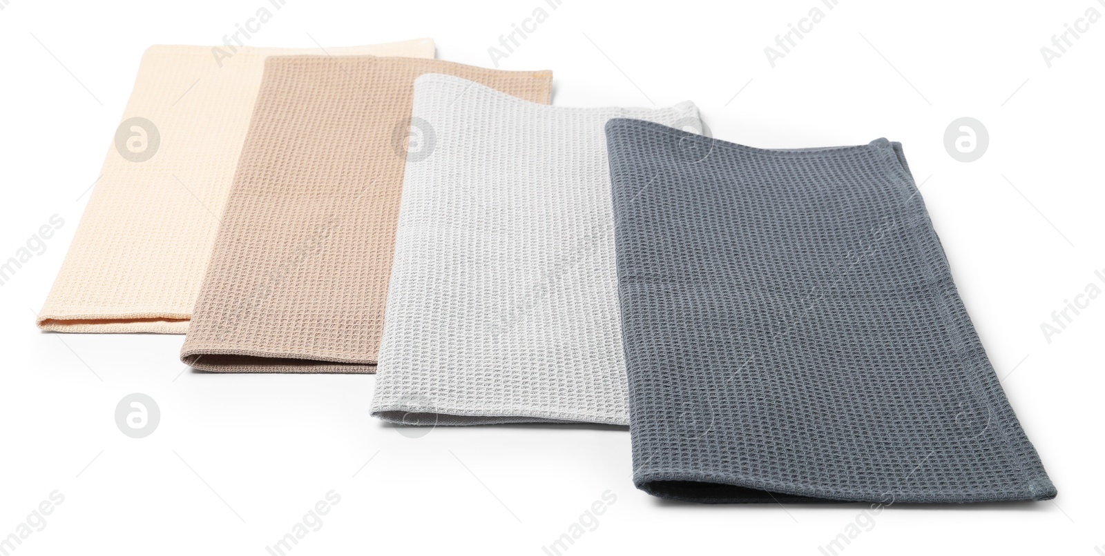 Many clean waffle towels isolated on white Photo of Many clean waffle towels isolated on white