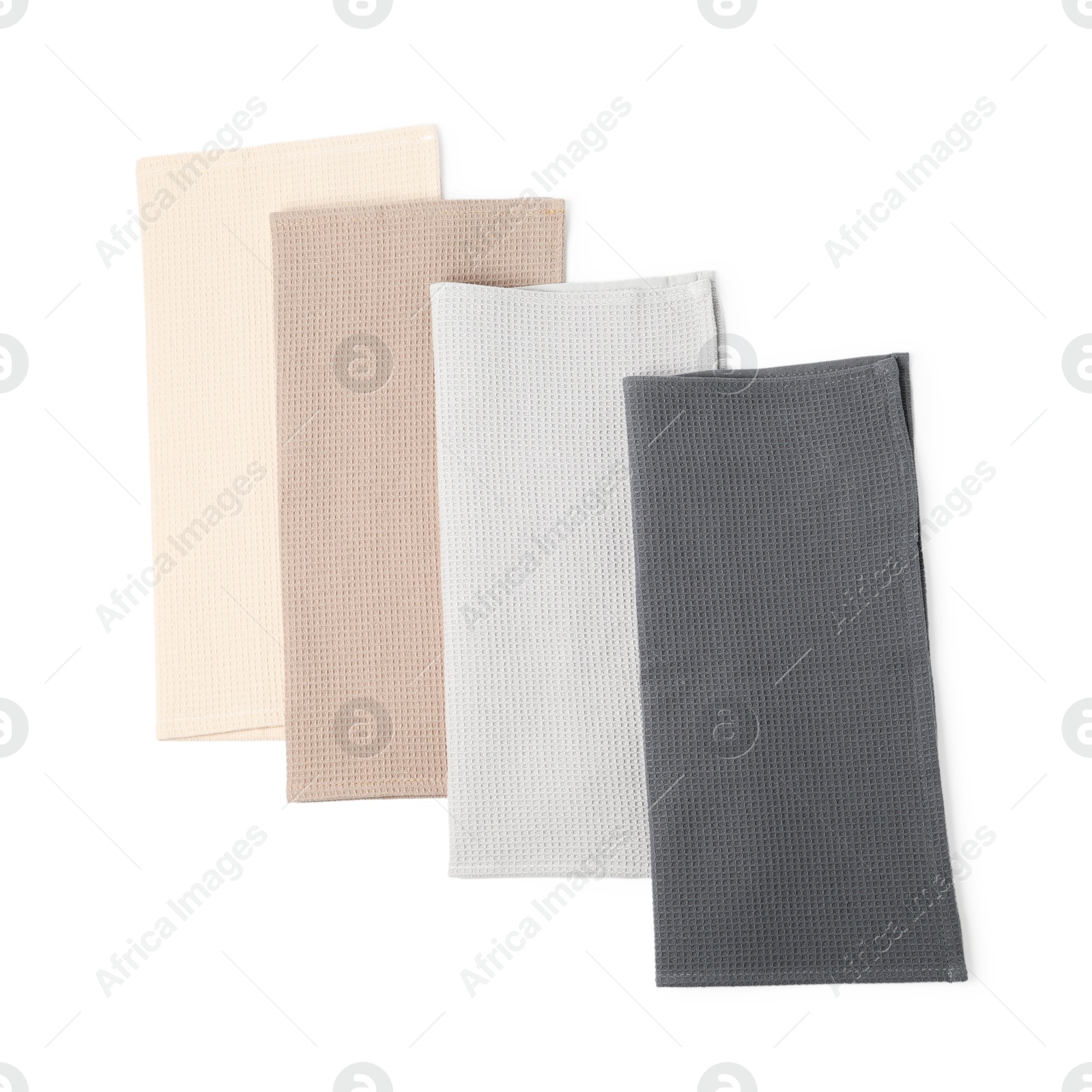 Many clean waffle towels isolated on white, top view Photo of Many clean waffle towels isolated on white, top view