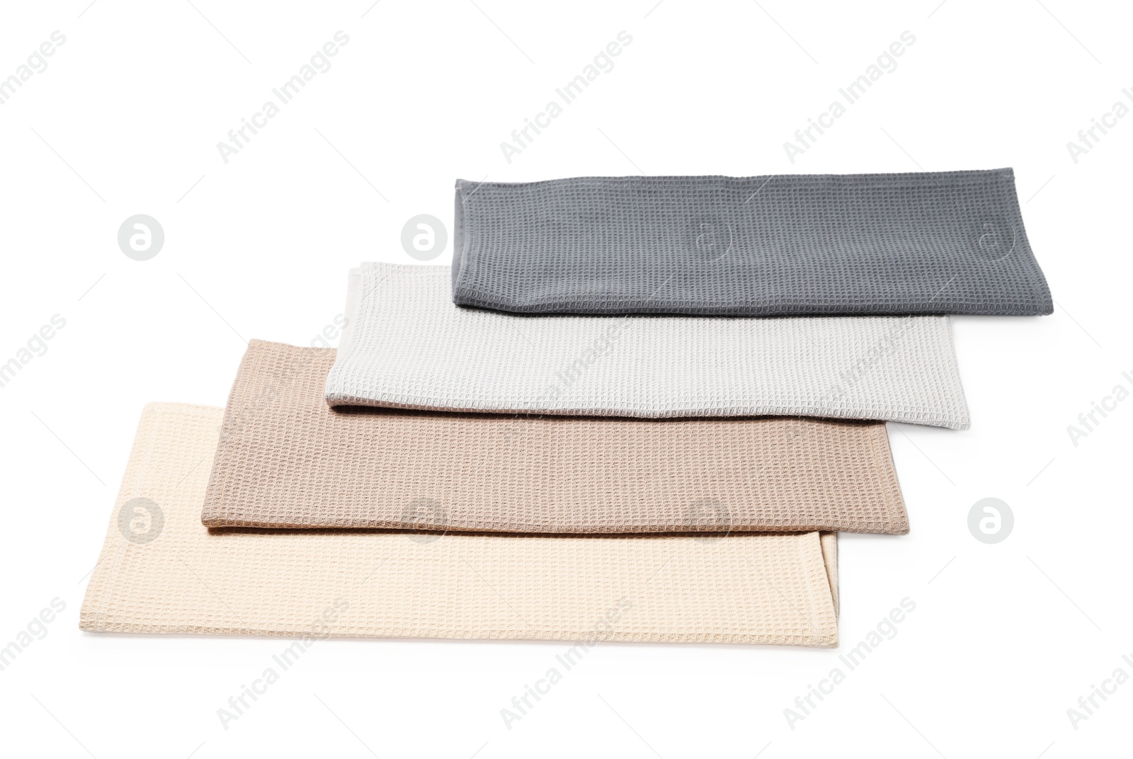 Many clean waffle towels isolated on white Photo of Many clean waffle towels isolated on white