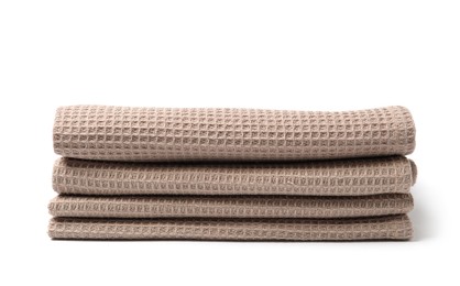 Photo of Many clean waffle towels isolated on white