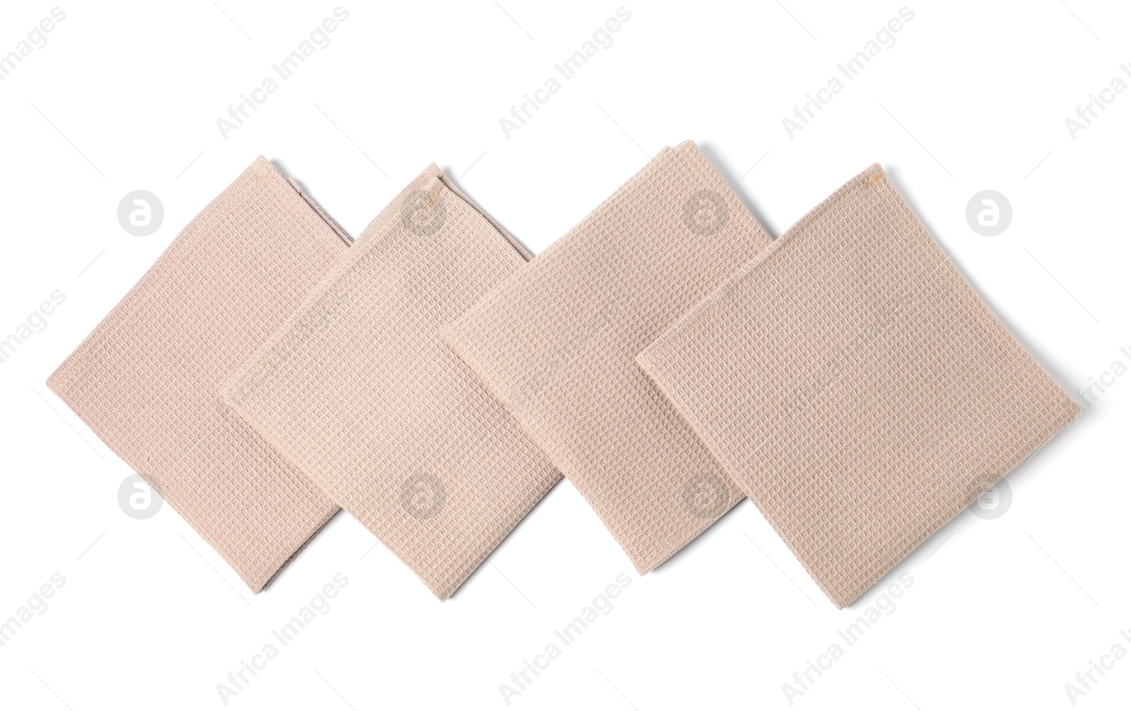 Many clean waffle towels isolated on white, top view Photo of Many clean waffle towels isolated on white, top view