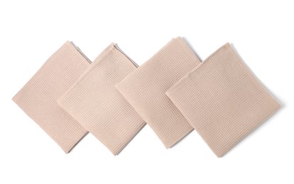 Photo of Many clean waffle towels isolated on white, top view