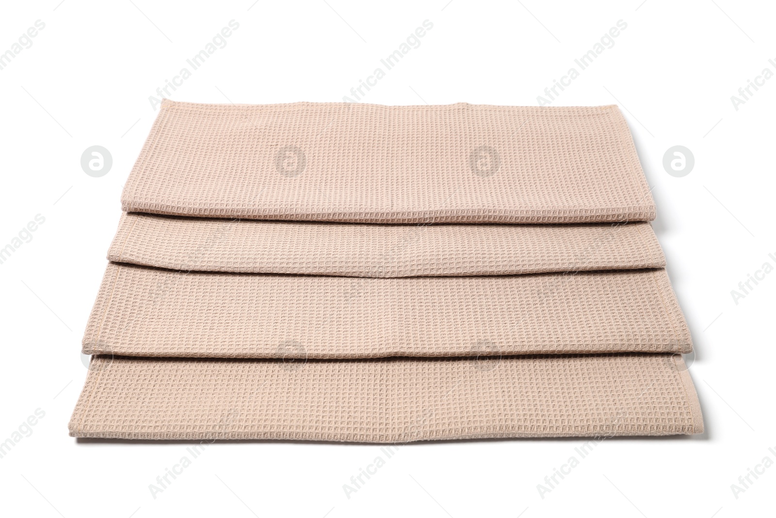 Many clean waffle towels isolated on white Photo of Many clean waffle towels isolated on white