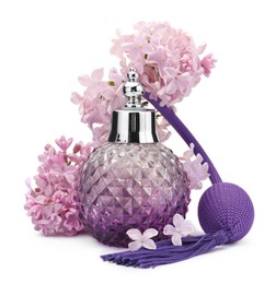 Photo of Luxury perfume and beautiful lilac flowers isolated on white