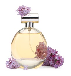 Photo of Luxury perfume and beautiful lilac flowers isolated on white