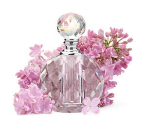 Photo of Luxury perfume and beautiful lilac flowers isolated on white