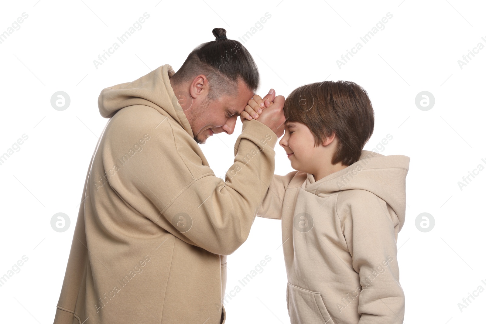 Father with his son on white background Photo of Father with his son on white background