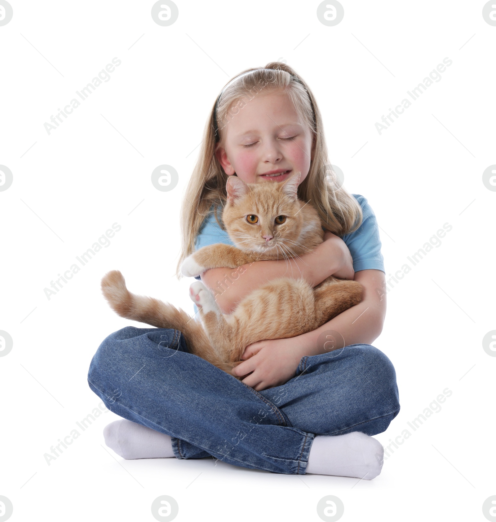 Little girl with her cute ginger cat on white background Photo of Little girl with her cute ginger cat on white background