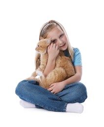 Photo of Little girl with her cute ginger cat on white background