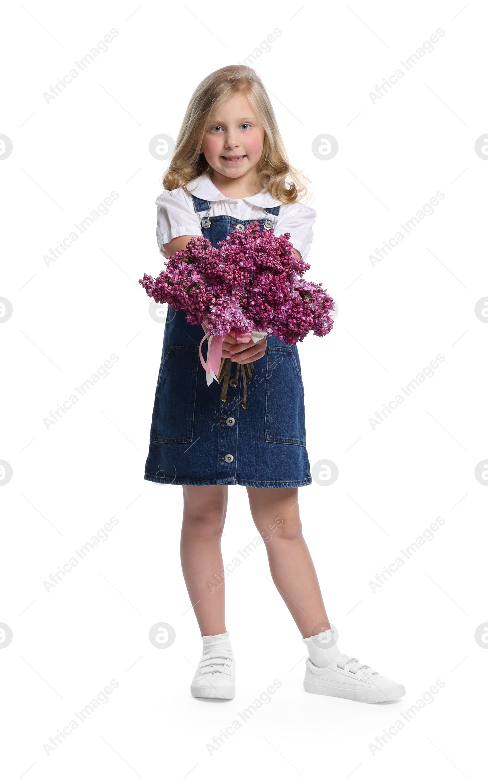 Little girl with bouquet of lilac flowers on white background Photo of Little girl with bouquet of lilac flowers on white background