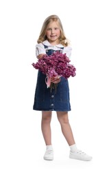 Photo of Little girl with bouquet of lilac flowers on white background