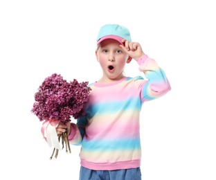 Photo of Surprised little girl with bouquet of lilac flowers on white background