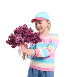 Photo of Little girl with bouquet of lilac flowers on white background