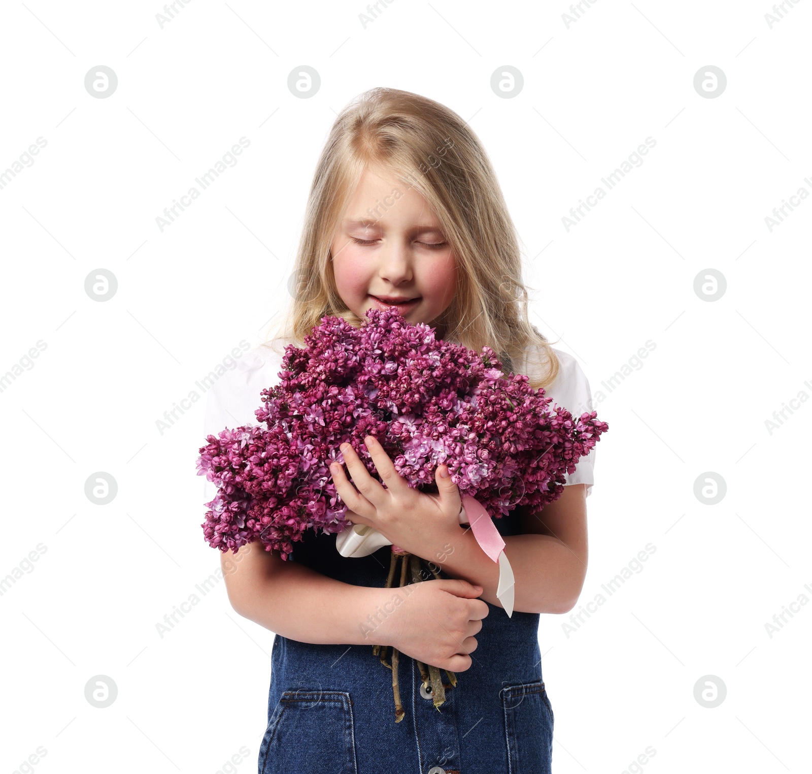 Little girl with bouquet of lilac flowers on white background Photo of Little girl with bouquet of lilac flowers on white background