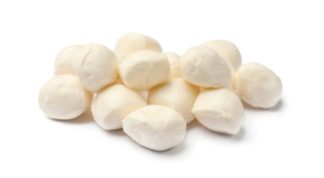 Photo of Many tasty mozzarella cheese balls isolated on white