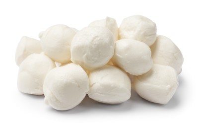 Photo of Many tasty mozzarella cheese balls isolated on white