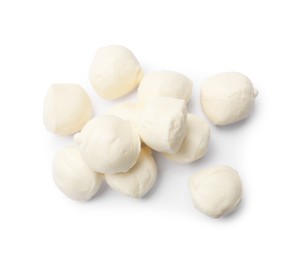 Photo of Many tasty mozzarella cheese balls isolated on white, top view