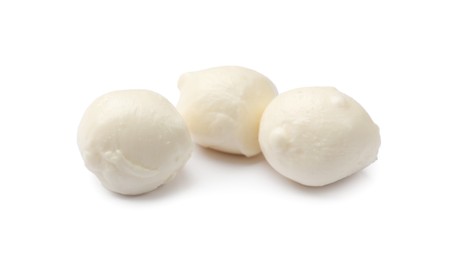 Photo of Three tasty mozzarella cheese balls isolated on white