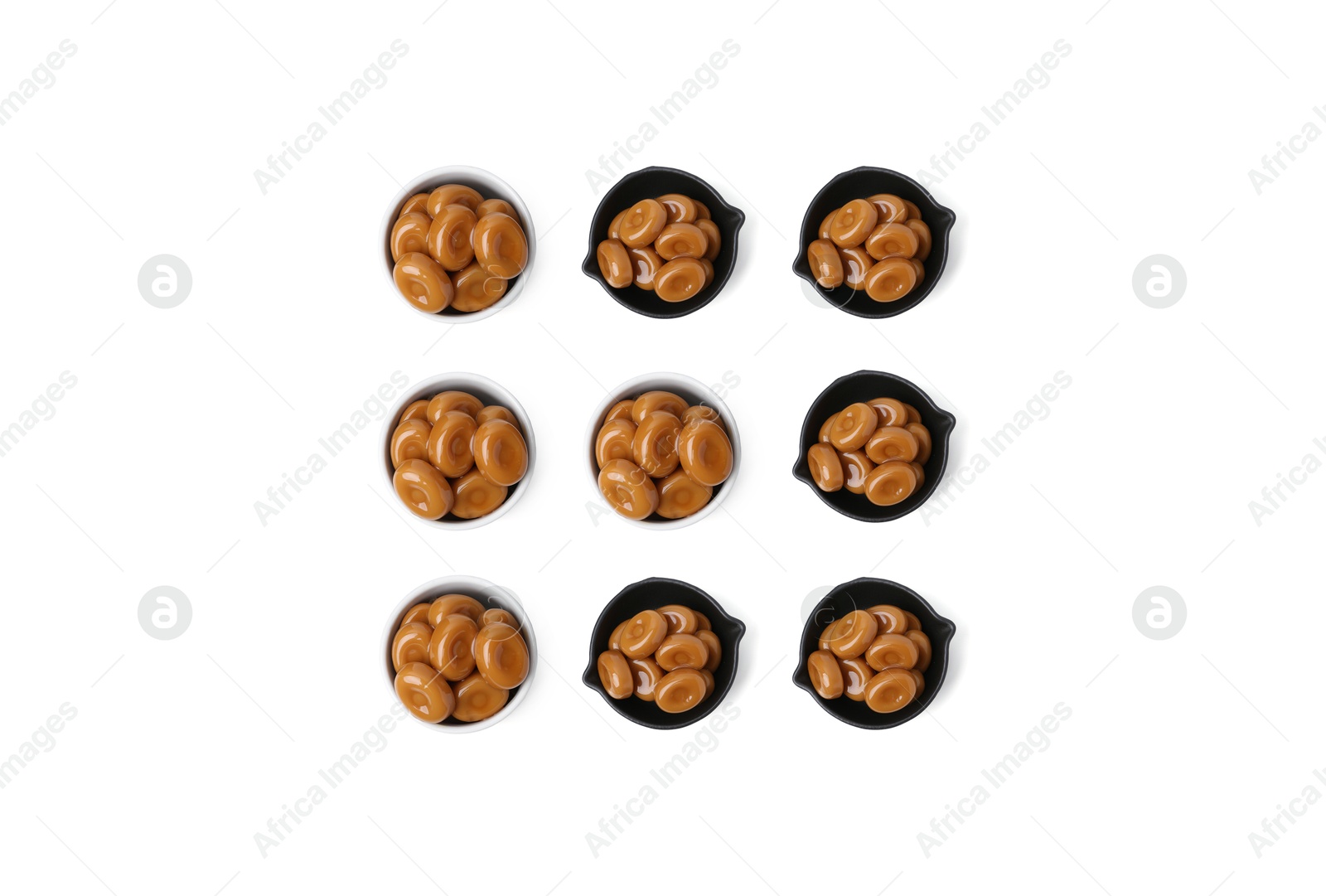 Tic-tac-toe game made of gard toffee candies in different containers on white background Image of Tic-tac-toe game made of gard toffee candies in different containers on white background