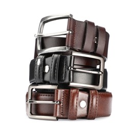 Photo of Three different leather belts isolated on white