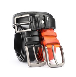 Photo of Three different leather belts isolated on white