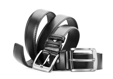 Photo of Two black leather belts isolated on white