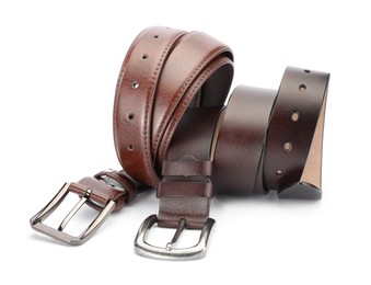 Photo of Two brown leather belts isolated on white