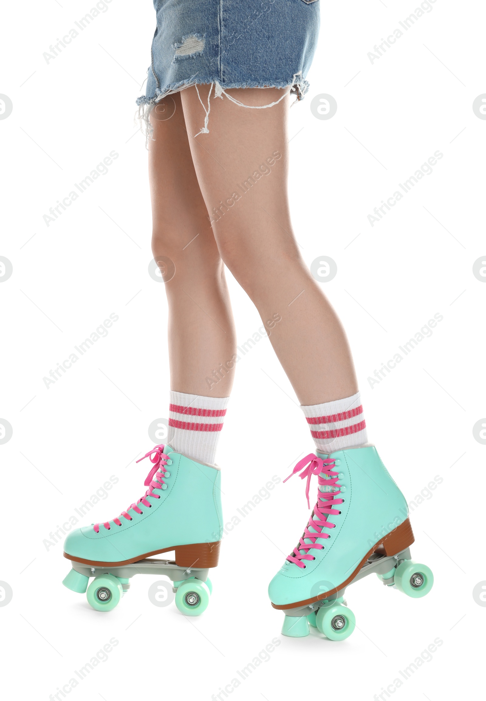 Woman in roller skates on white background, closeup Photo of Woman in roller skates on white background, closeup