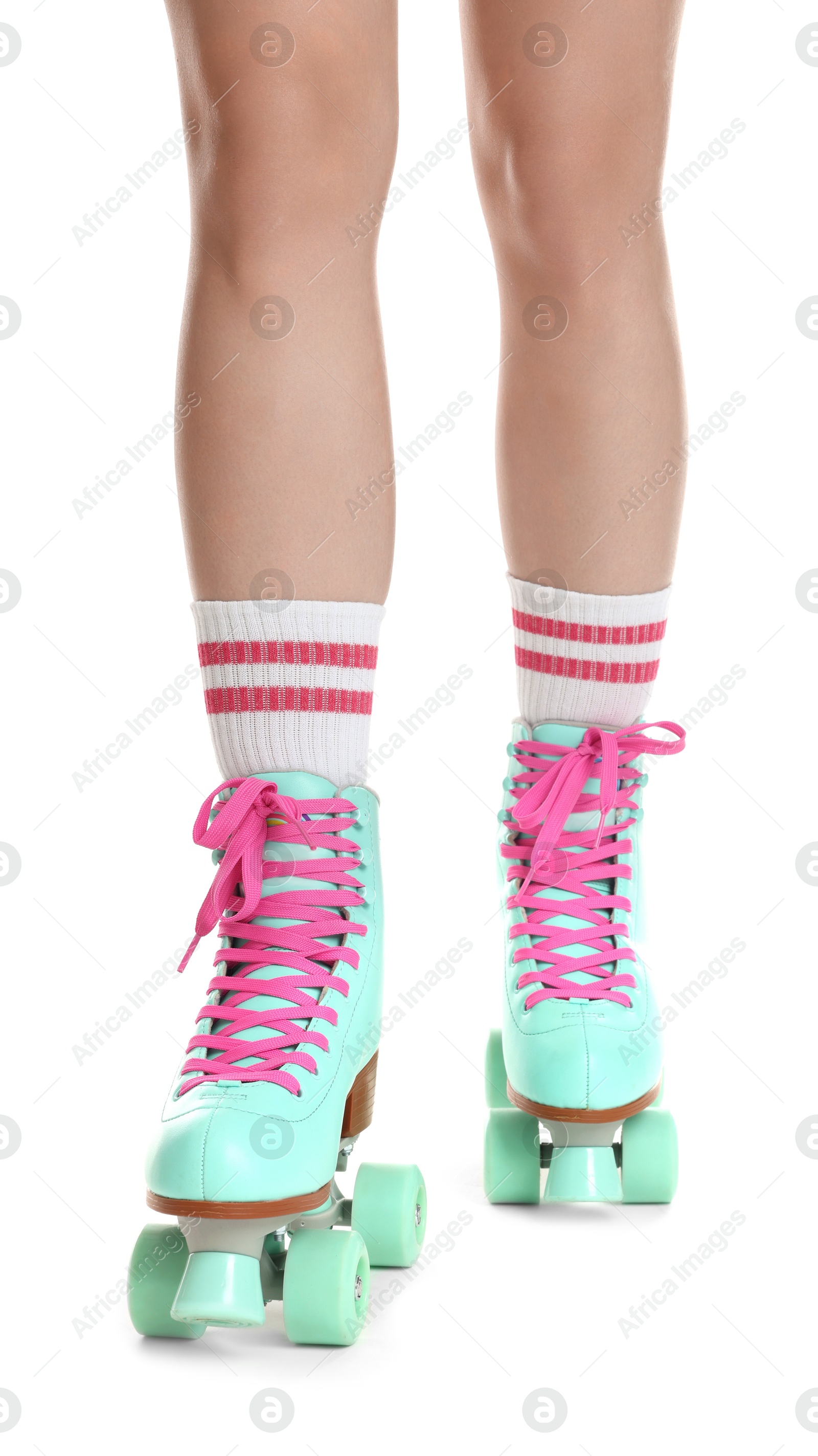 Woman in roller skates on white background, closeup Photo of Woman in roller skates on white background, closeup