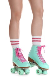 Photo of Woman in roller skates on white background, closeup