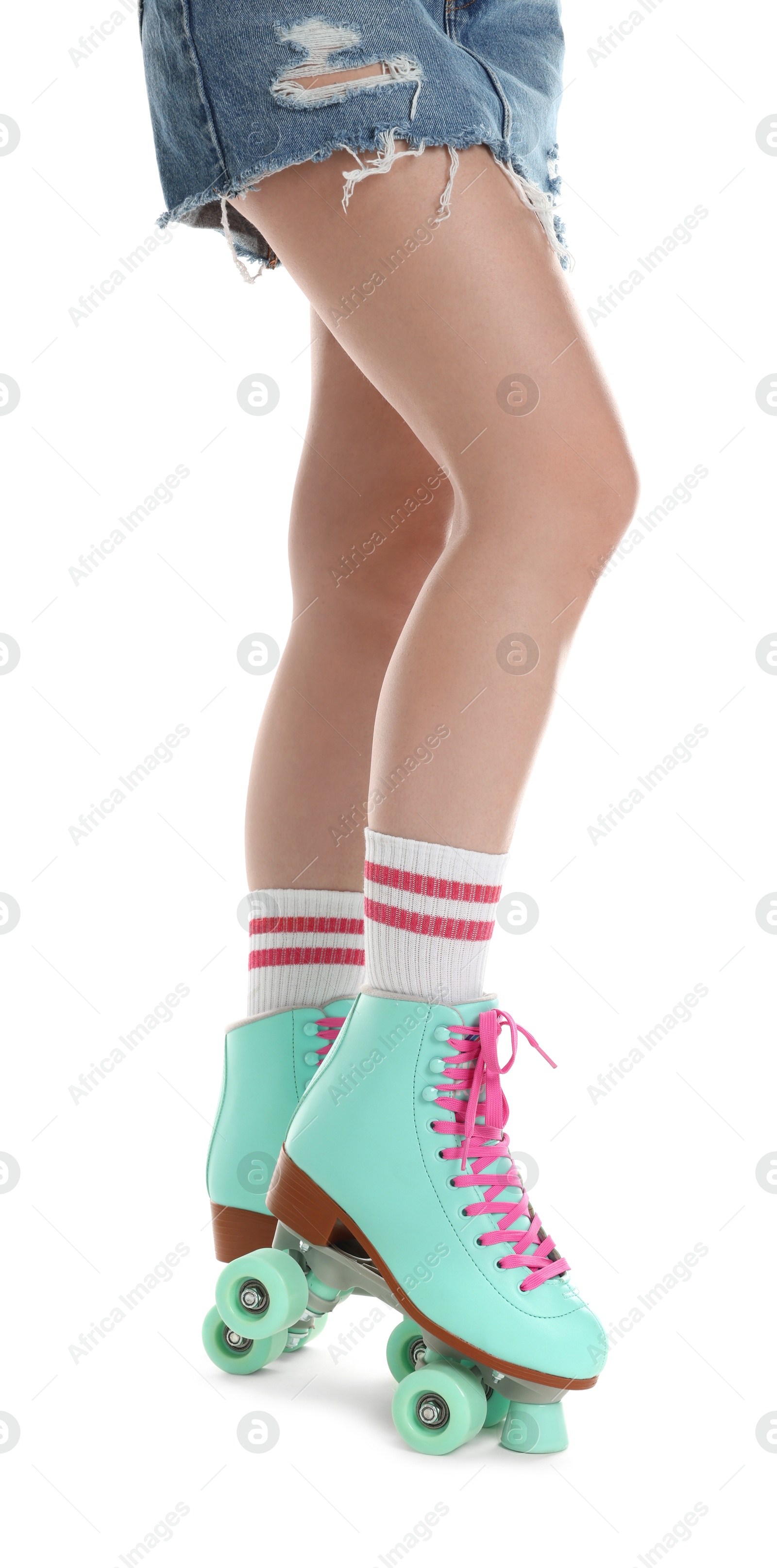 Woman in roller skates on white background, closeup Photo of Woman in roller skates on white background, closeup