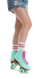 Photo of Woman in roller skates on white background, closeup