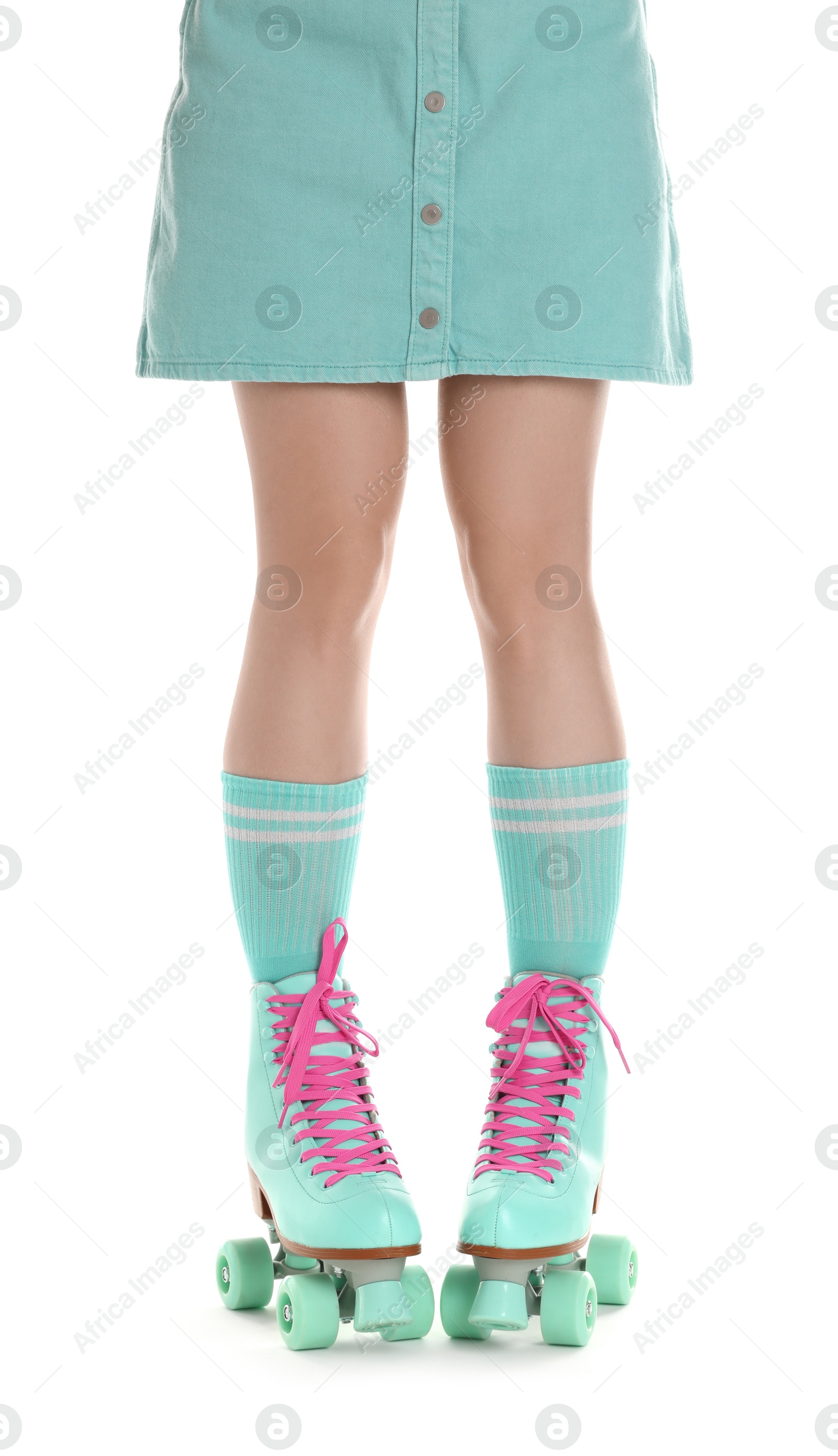 Woman in roller skates on white background, closeup Photo of Woman in roller skates on white background, closeup