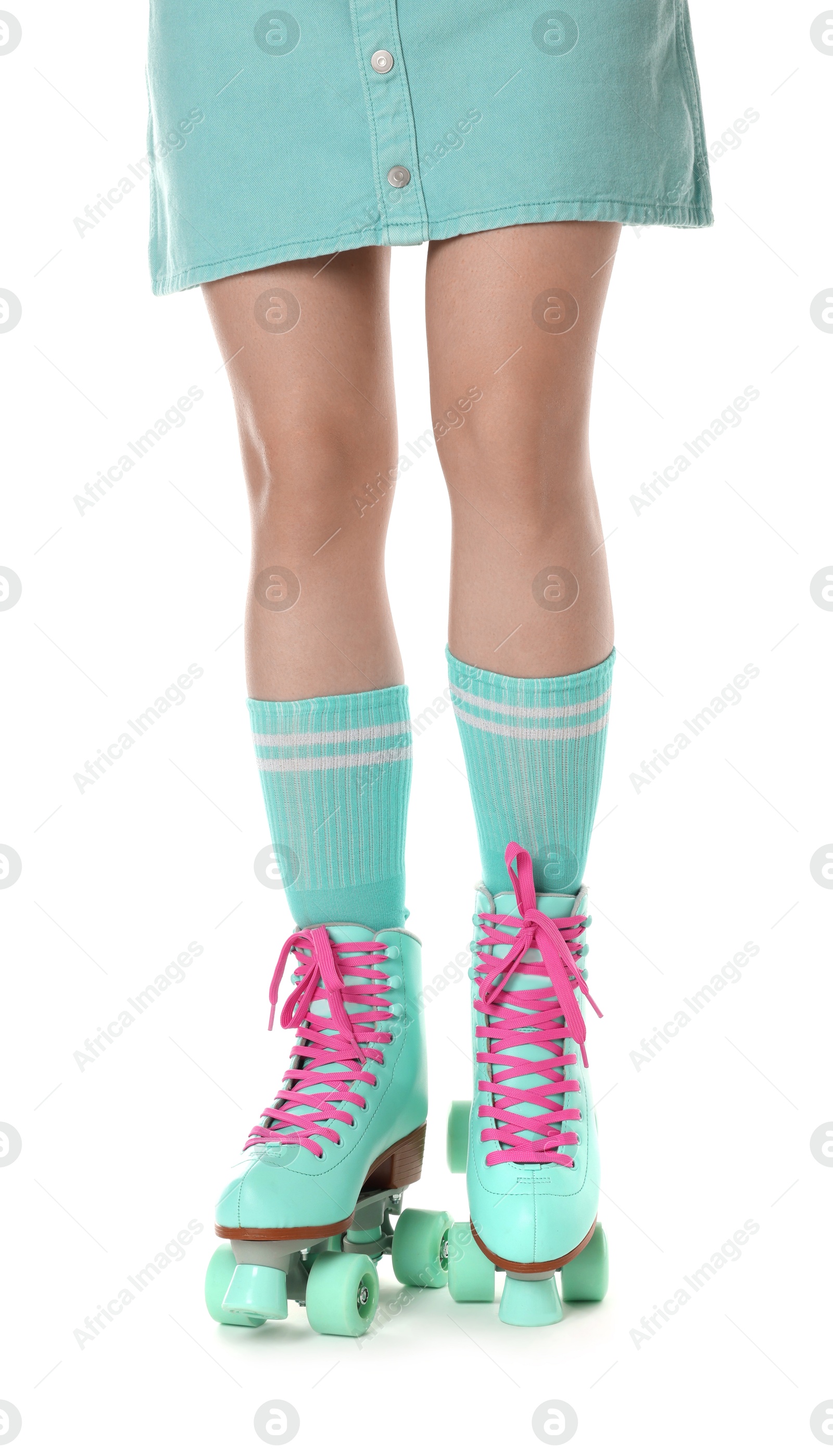 Woman in roller skates on white background, closeup Photo of Woman in roller skates on white background, closeup